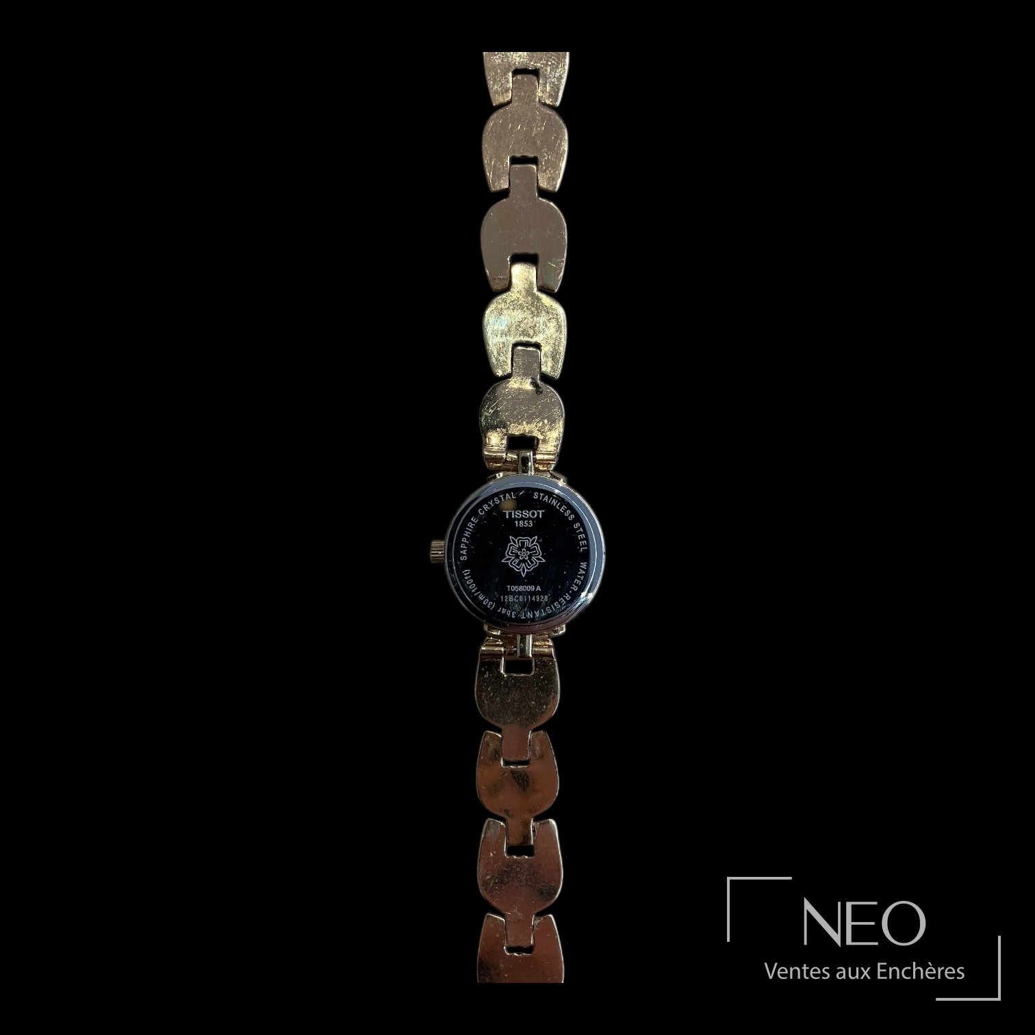 Fond gravé Tissot avec référence T058009 A et numéro 12BC0114928