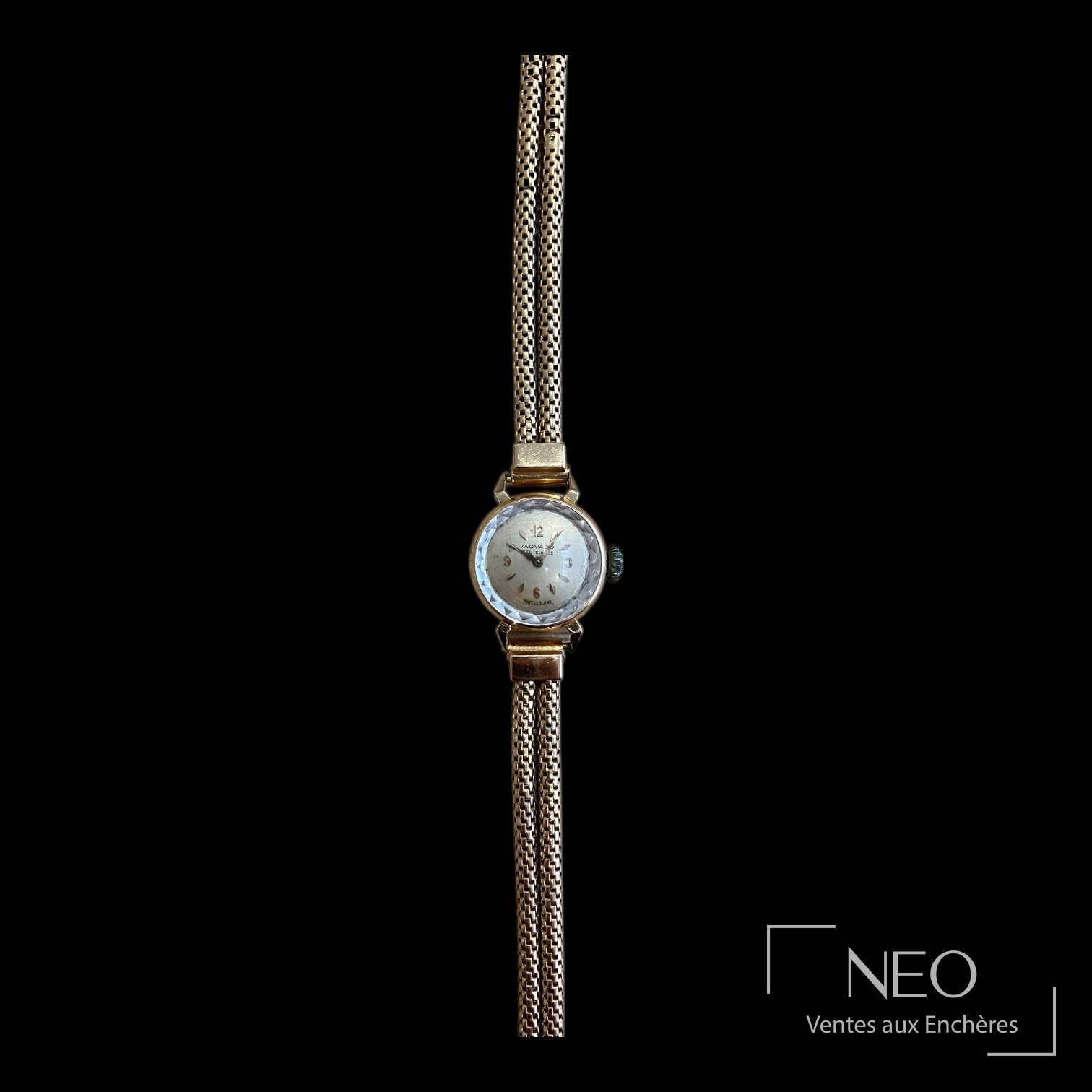 Montre bracelet Movado en or jaune, cadran rond gris et bracelet souple