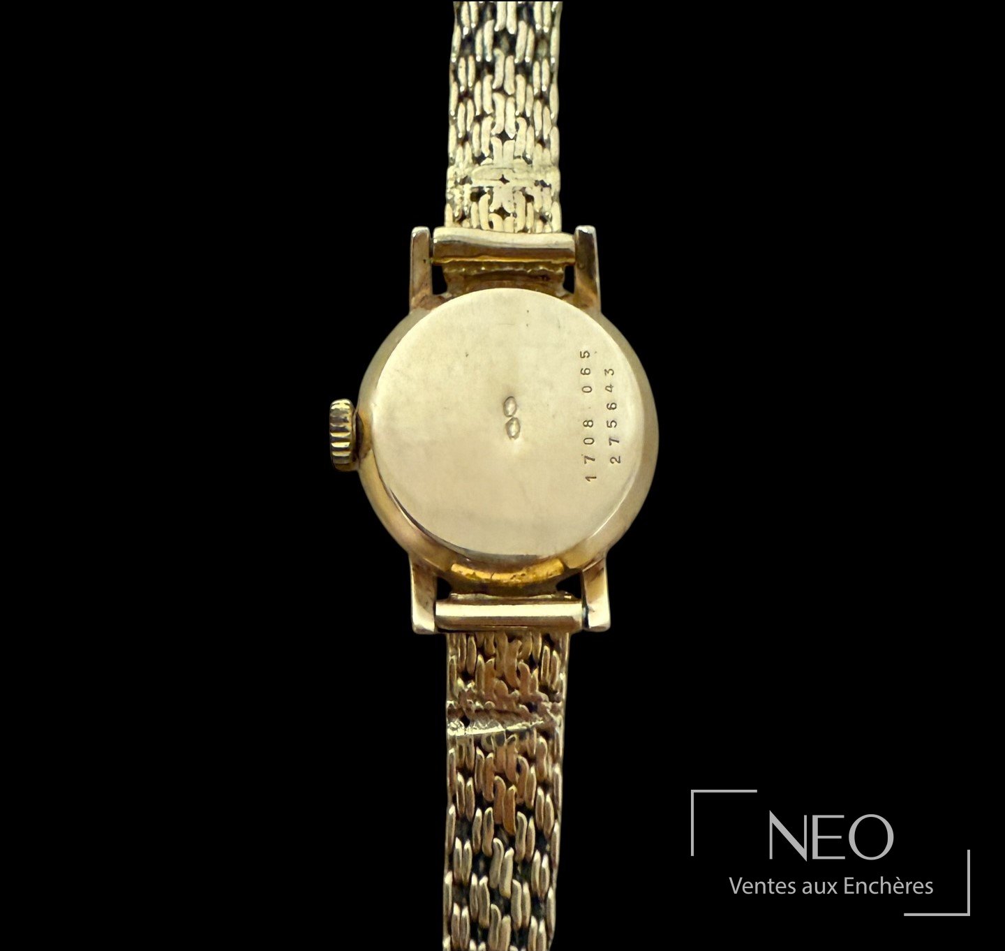 Dos de la montre CERTINA en or jaune avec numéro gravé sur le fond