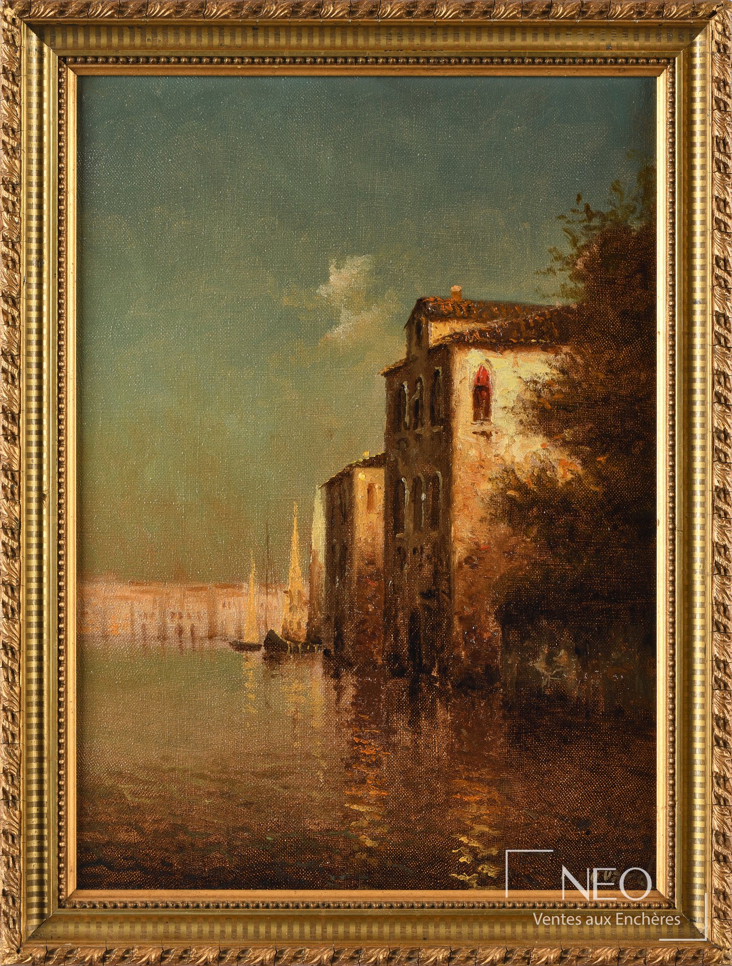 Toile encadrée présentant la Vue de Venise dans son cadre doré sculpté